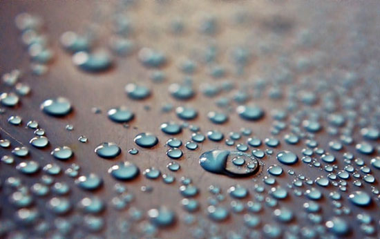 Water droplets on a surface, which could skew wood moisture meter readings