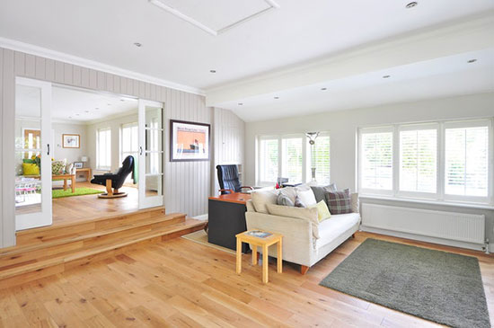 A living room with a high-quality oak floor that was measured with a moisture meter during installation
