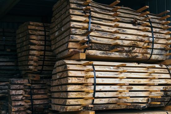 Stacks of lumber that will need to have their moisture content measured with a pinless moisture meter