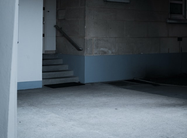 A basement with a concrete floor