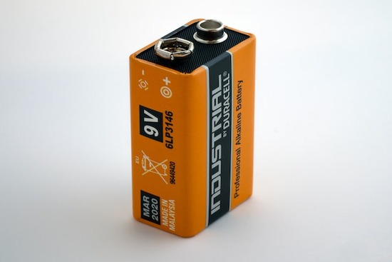 An orange battery for a moisture meter