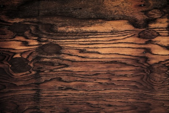 A type of wood with a wavy grain and some knots