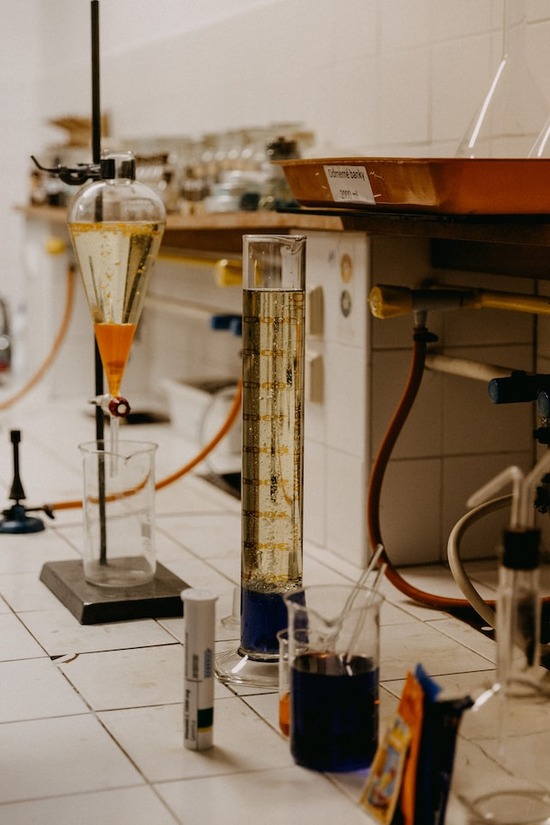 Flasks and chemicals in a scientific lab for the distillation method of moisture testing