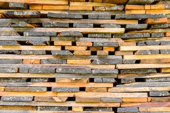 Stacks of wood that have cracked during the air-drying process