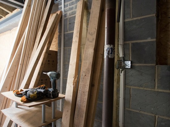 Wood boards leaning against a wall