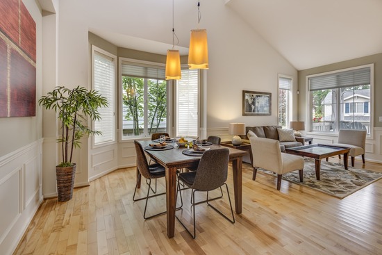  A living room and dining room with a beautiful oak wood floor that is free of moisture damage