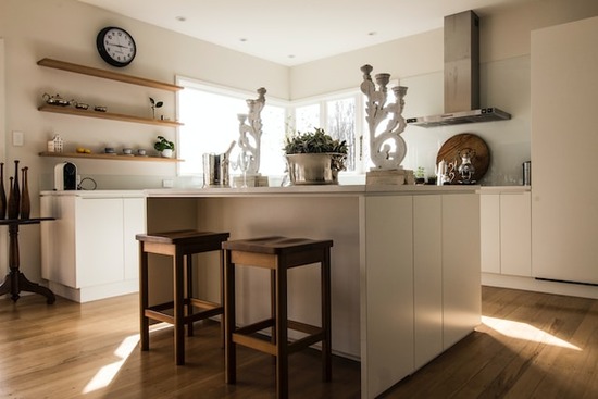 Wooden stools at a kitchen island