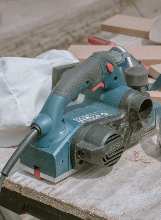 A sander used for refinishing a hardwood floor