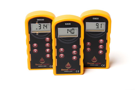 Three Bessemeter moisture meters upright next to each other