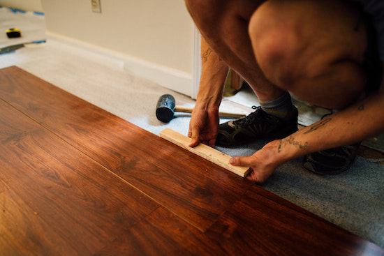  A floor installer putting in a floor