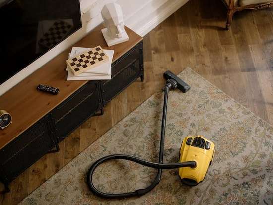 A vacuum that's been left on the floor