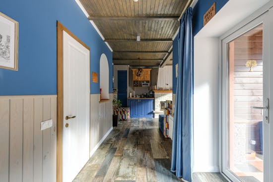 A house with wide engineered wood floorboards