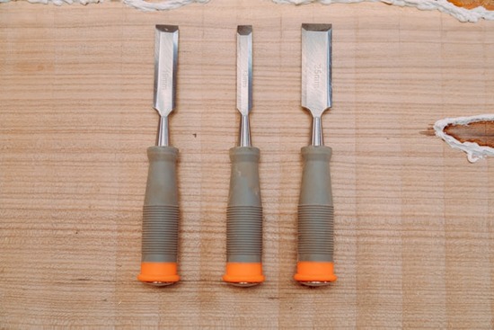 A set of three chisels, which are good for prepping the subfloor