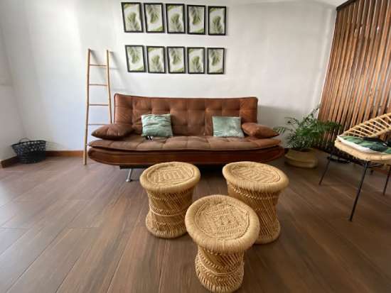 A dark brown floating floor installed in a living room