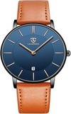 Analog watch with a navy blue face and an orange leather strap