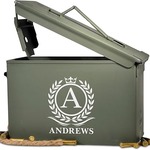 A metal ammo box with a monogram and name printed on it